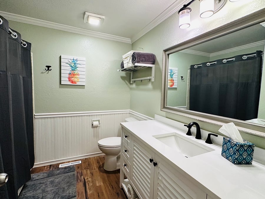 Extra bathroom with new vanity, flooring and toilet