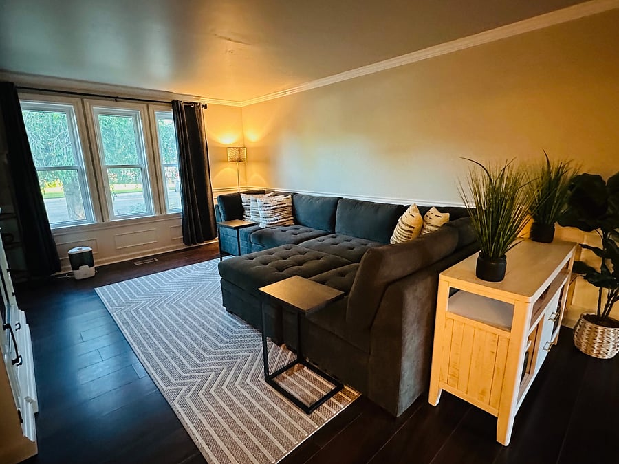 Living Room layout with three windows facing the front of the house