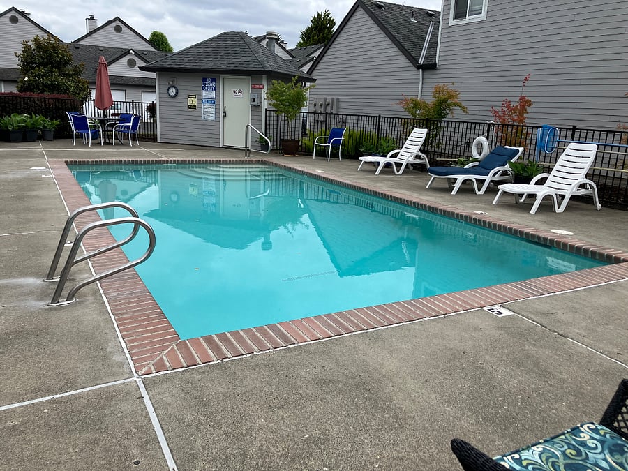 Community pool is just behind my home. It is very convenient and I have never been bothered with noise. There are more chairs and tables than in this pic.