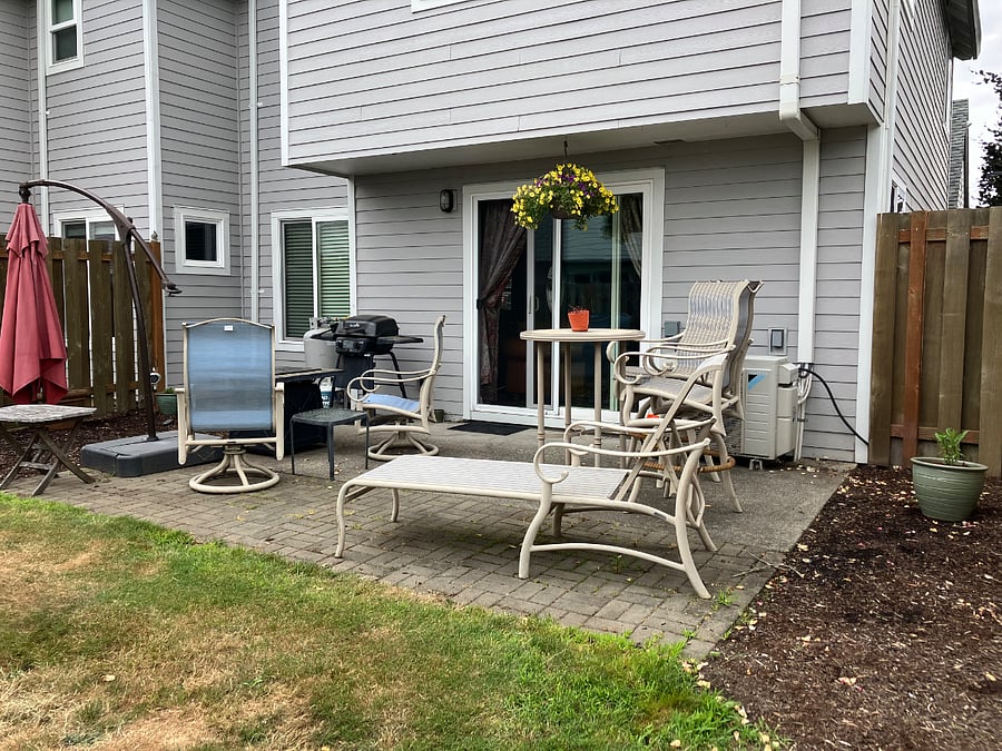 Back patio is still a work in progress! LOL. But it is a lovely place to cookout or relax by the fire pit.