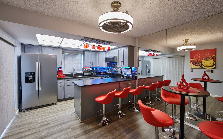 downstairs kitchen, 2 cappuccino machines, small regular small coffee machine, and cable tv
