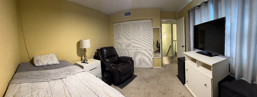 upstairs 11'x13' bedroom and small fridge