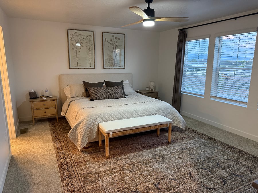 Main Bedroom with King pottery barn bed and memory foam mattress, large windows, full length mirror and ceiling fan

