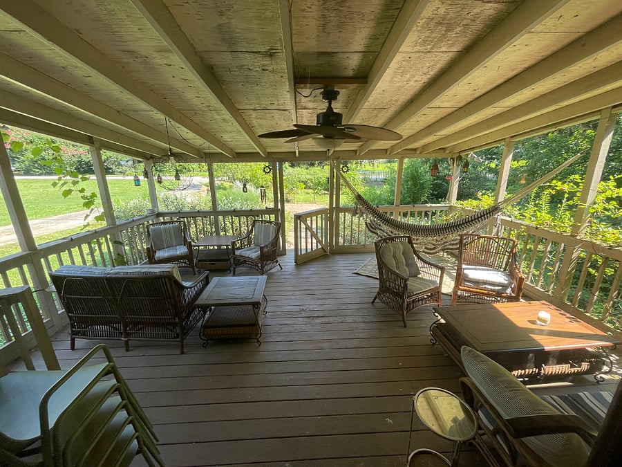 View of porch and front yard from the front door.
