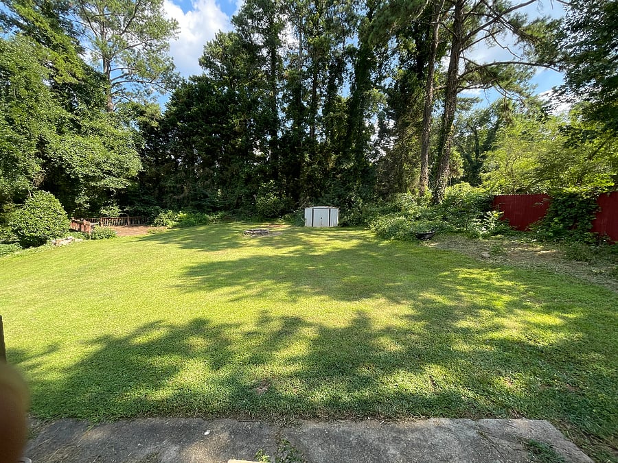 Large, fully fenced backyard.