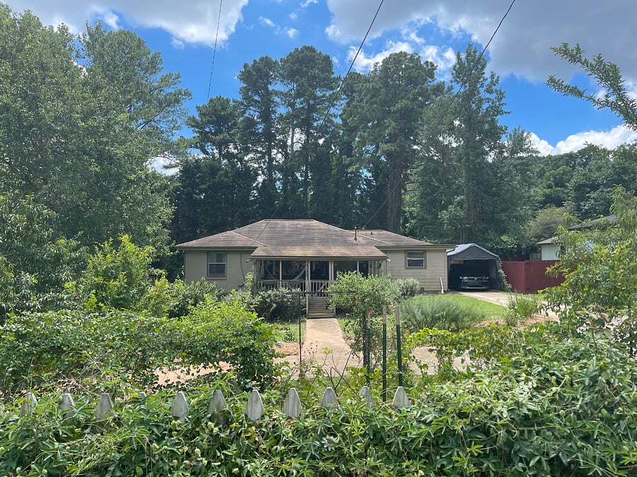 Set back from the street with ample garden space in between and a rainbow drive.