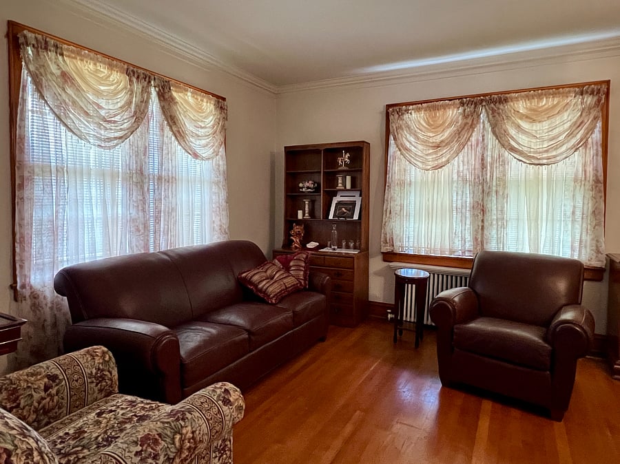 Living room. Shared. Includes Monopoly table, board games, and local information.