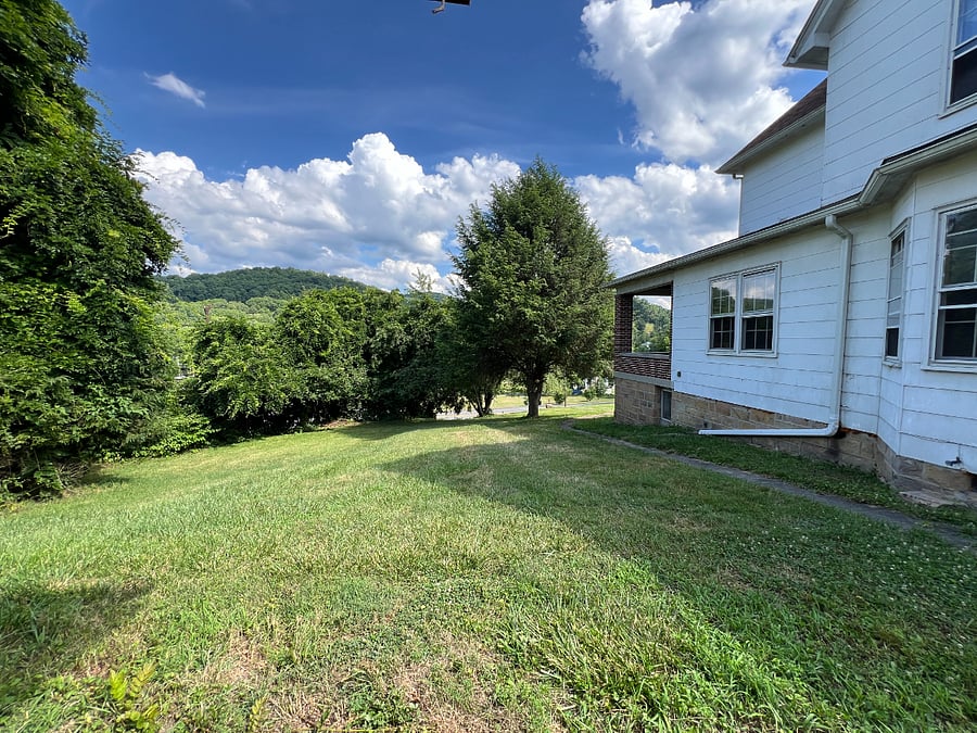 Side-view of house from parking area.