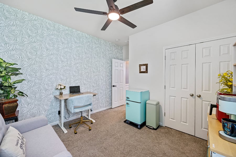 Adorable retro-inspired coffee bar with extra storage space. That includes a cute vintage mini fridge, microwave, Keurig and air fryer for quick bites or cozy coffee moments. A fun and functional space made comfortable and convenient.