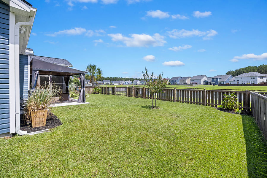 Enjoy the private, fenced yard with serene pond views. For added pleasure, enjoy meeting our neighborly ducks as they visit occasionally. It's your own little slice of serenity.