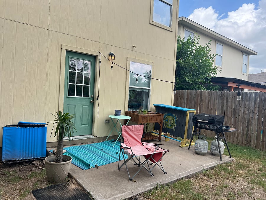 View of the back patio. Blackstone grill, a lounge chair you're welcome to use and a camping chair which I have plenty more of in the garage if needed