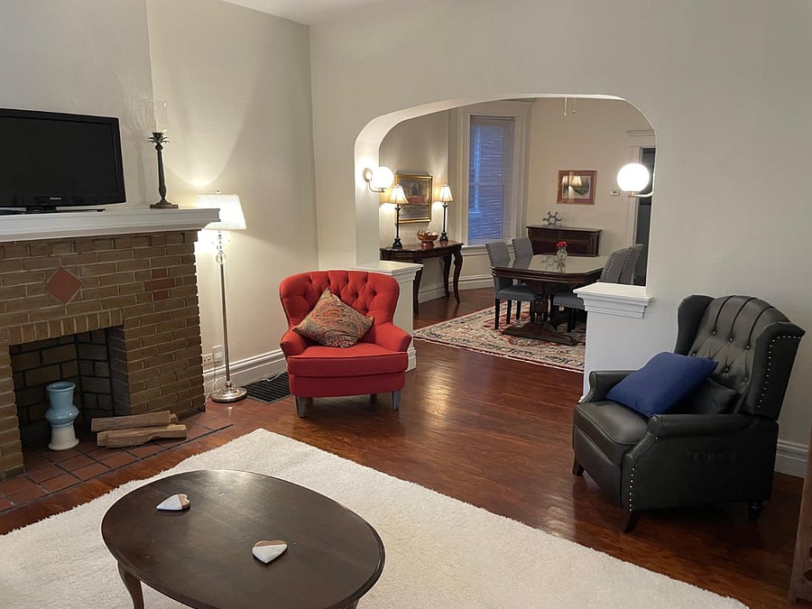 Living room facing into dining room