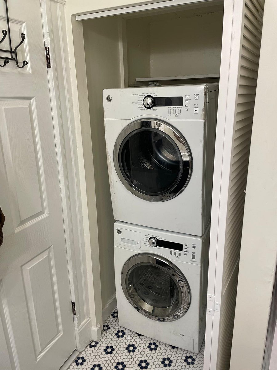 Washer and dryer (tucked behind screen door)