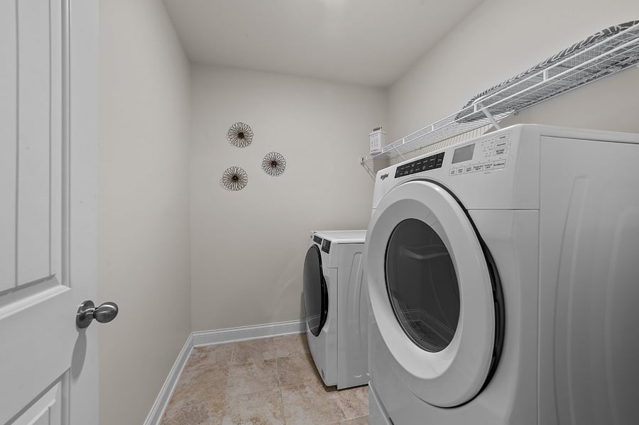 Laundry room with full sized washer and dryer