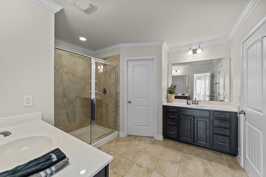 Primary bathroom - double vanity, two walk-in closets