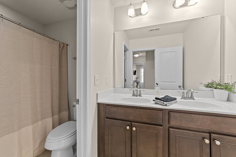 Upstairs hall bathroom - double vanity, full tub and shower