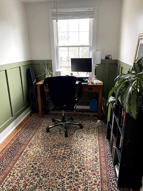 Office - dedicated work space with desk, chair and bookshelf