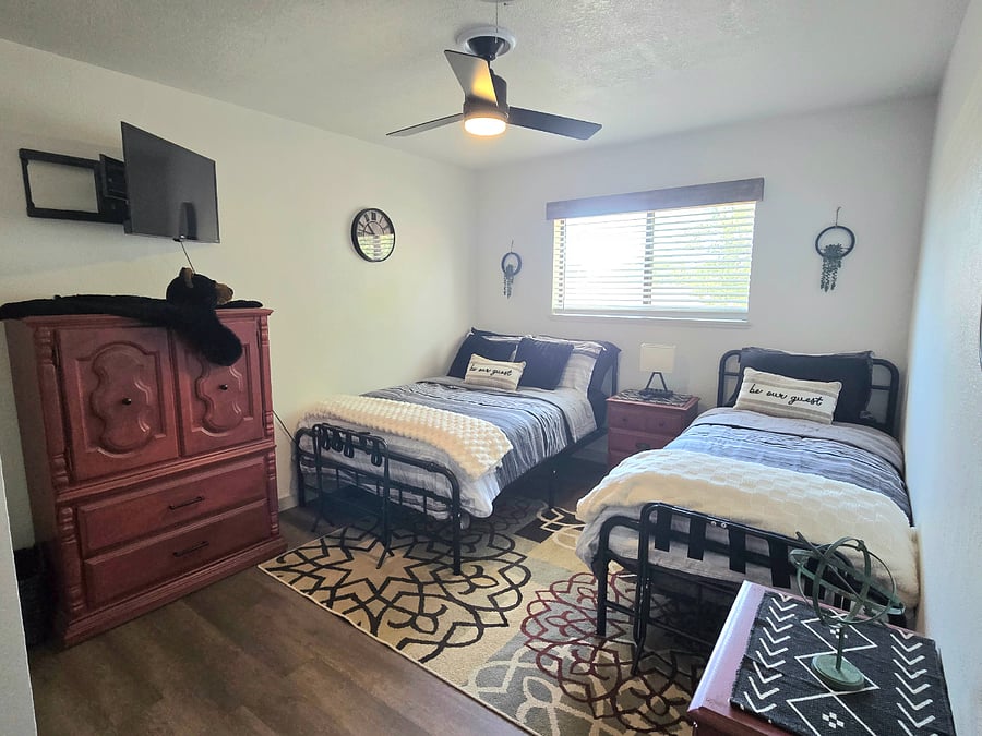 Bedroom 2 has 1 full size and 1 twin size bed