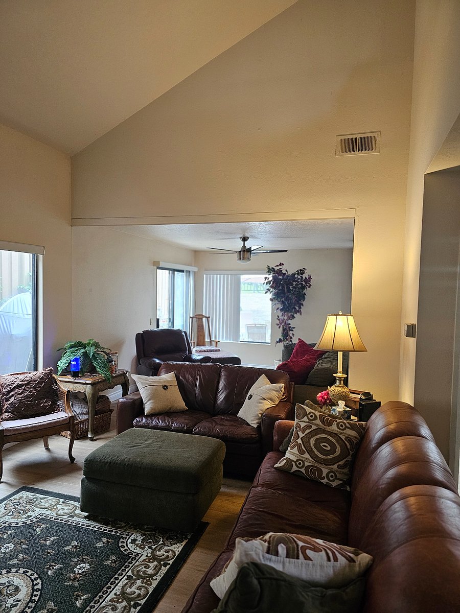 Livingroom expands to backyard patio area.