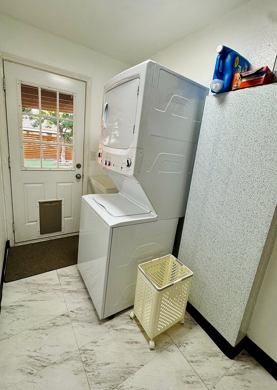 In-unit washer and dryer combo, utility wash tub and backyard access