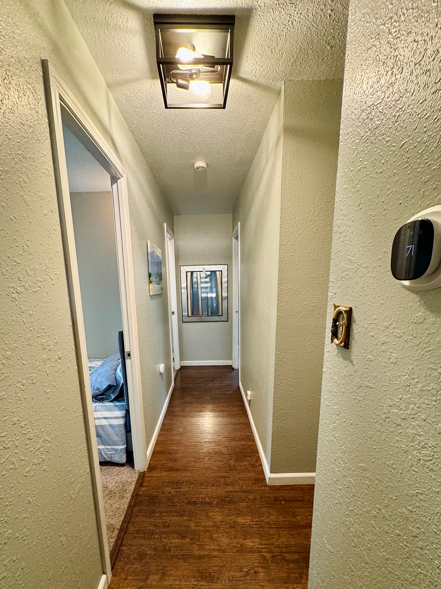 Main hallway. Bedrooms 2 & 3 on the left. Master is the back right corner