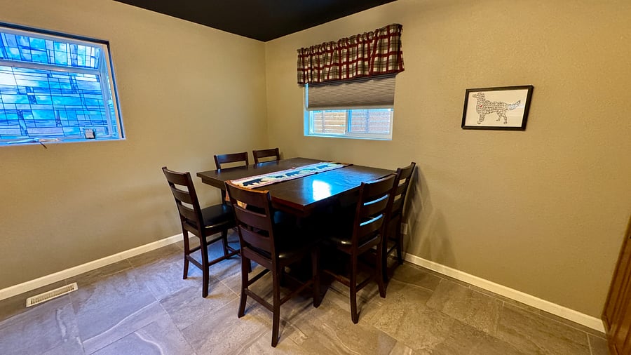 Dining room table for 6 with mountain views in the winter