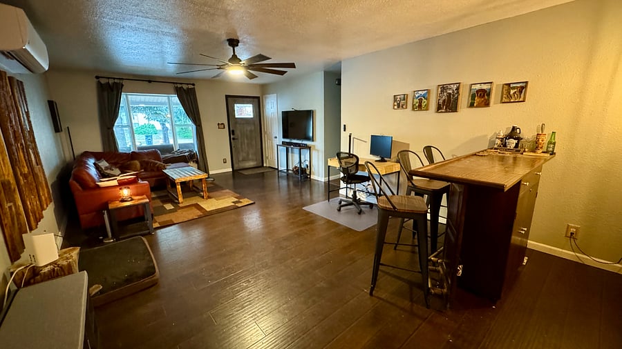 Large great room with giant ceiling fan