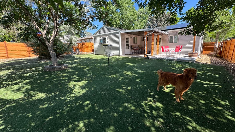 Yard extends to the front of the house on both sides. Both sides have a gate.