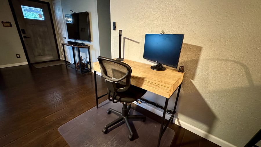 Office space with phone charging lamp and monitor to plug into