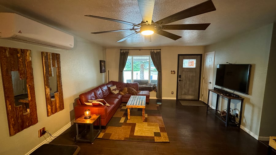 Entry way / Living room. Bay window acts as additional seating. SmartTV