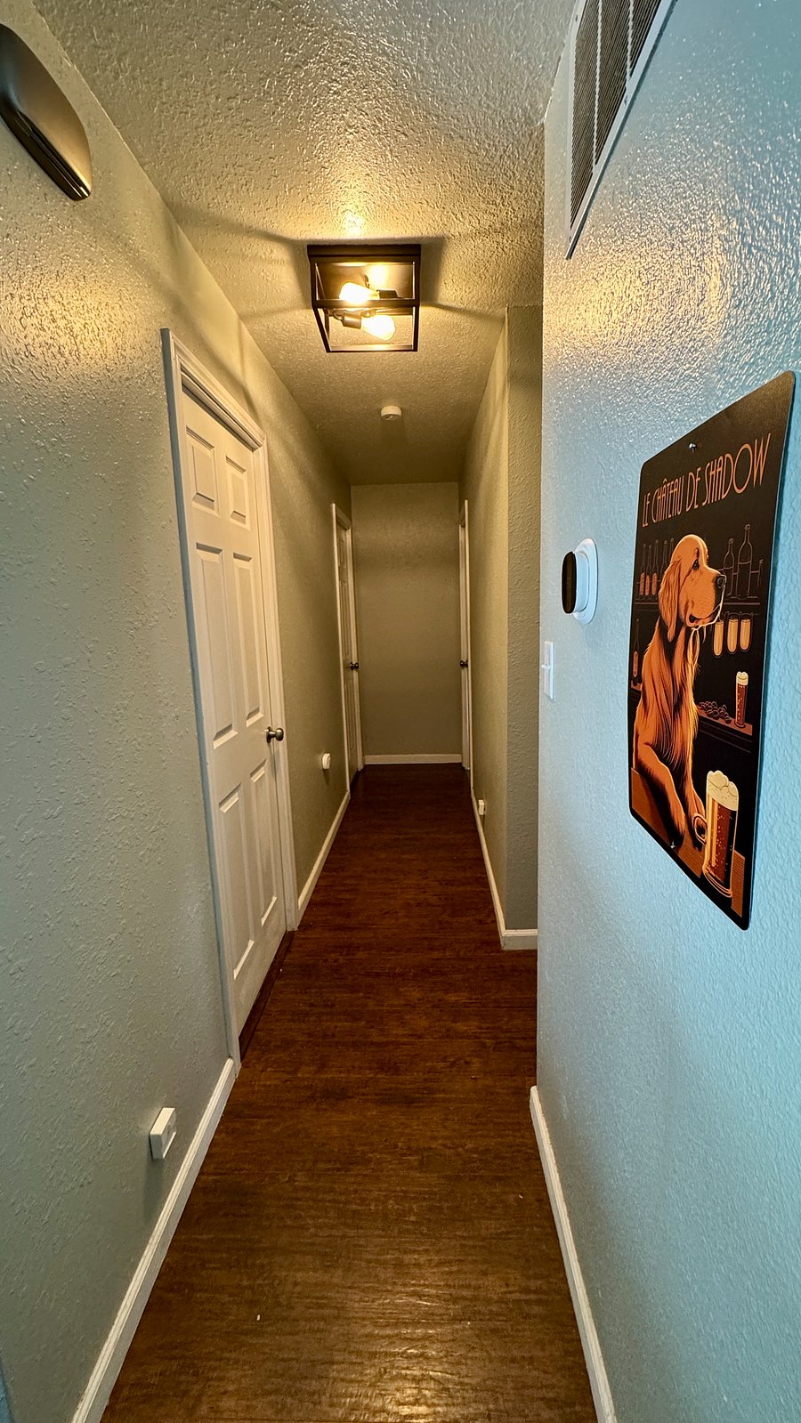 Hallway - two guest bedrooms on the left. 
Bath, laundry, and master bedroom on the right