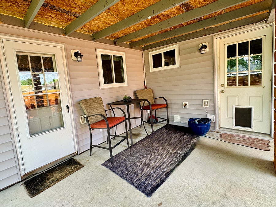 Bistro set with access to kitchen and laundry room (dog door to laundry room)