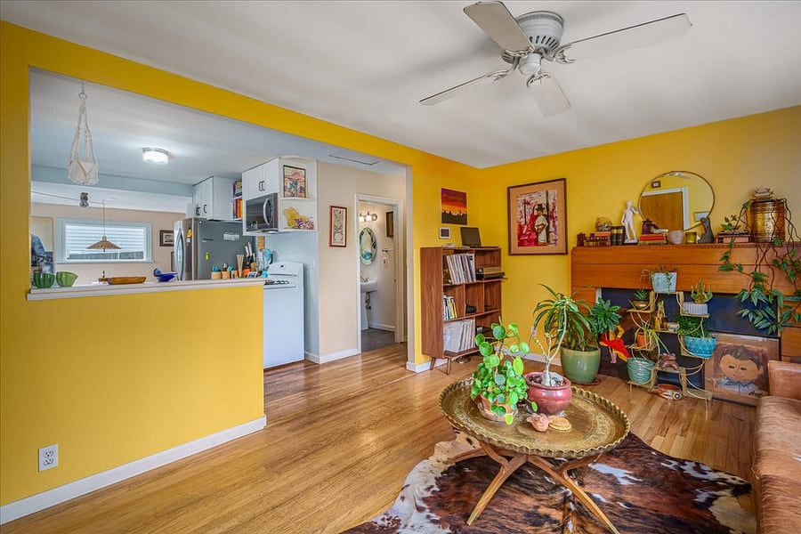 from living room corner looking to kitchen and bath