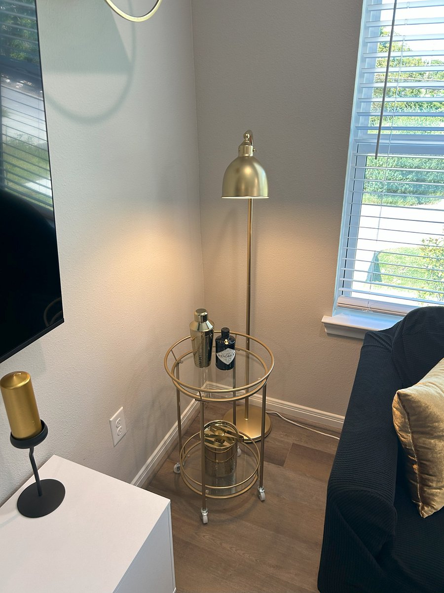 A bar cart is provided for entertaining guests.