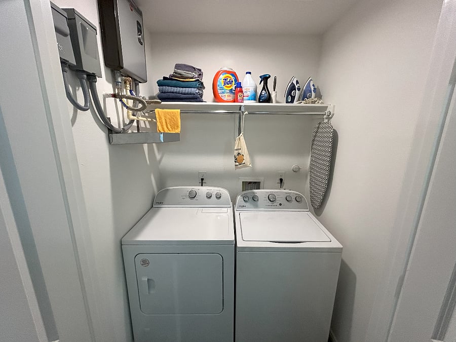 An in-unit washer/dryer and tankless water heater only add to the modern conveniences this unit provides.