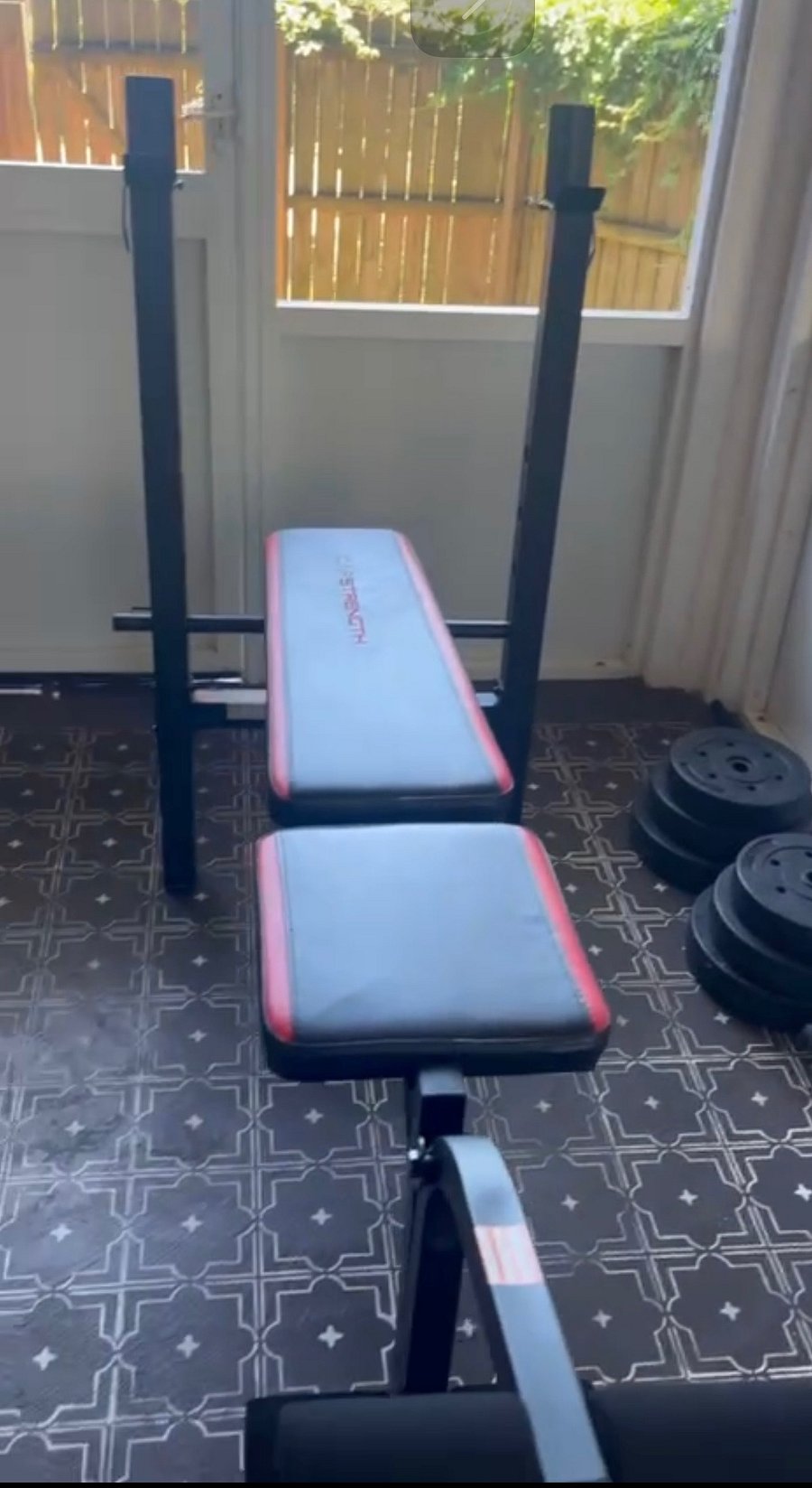 Weight bench with barbell
