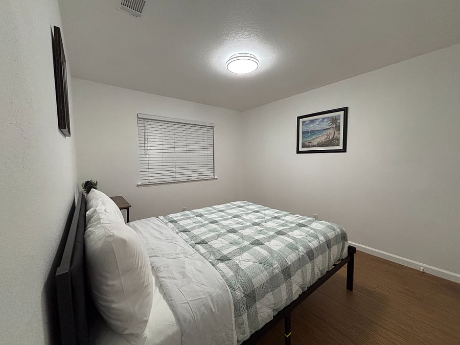 Second bedroom with window to the front of the house