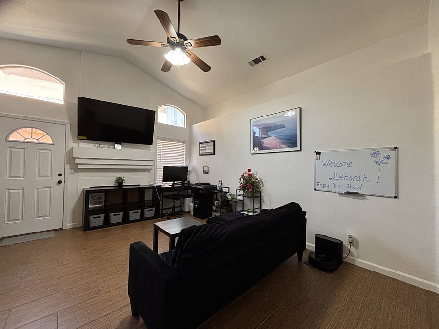 Living room with a working desk ready for working from home.