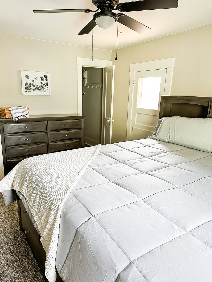 Bedroom 1: King Size bed, TV, Ceiling Fan and private closet. Ample storage for your clothing and personal items.