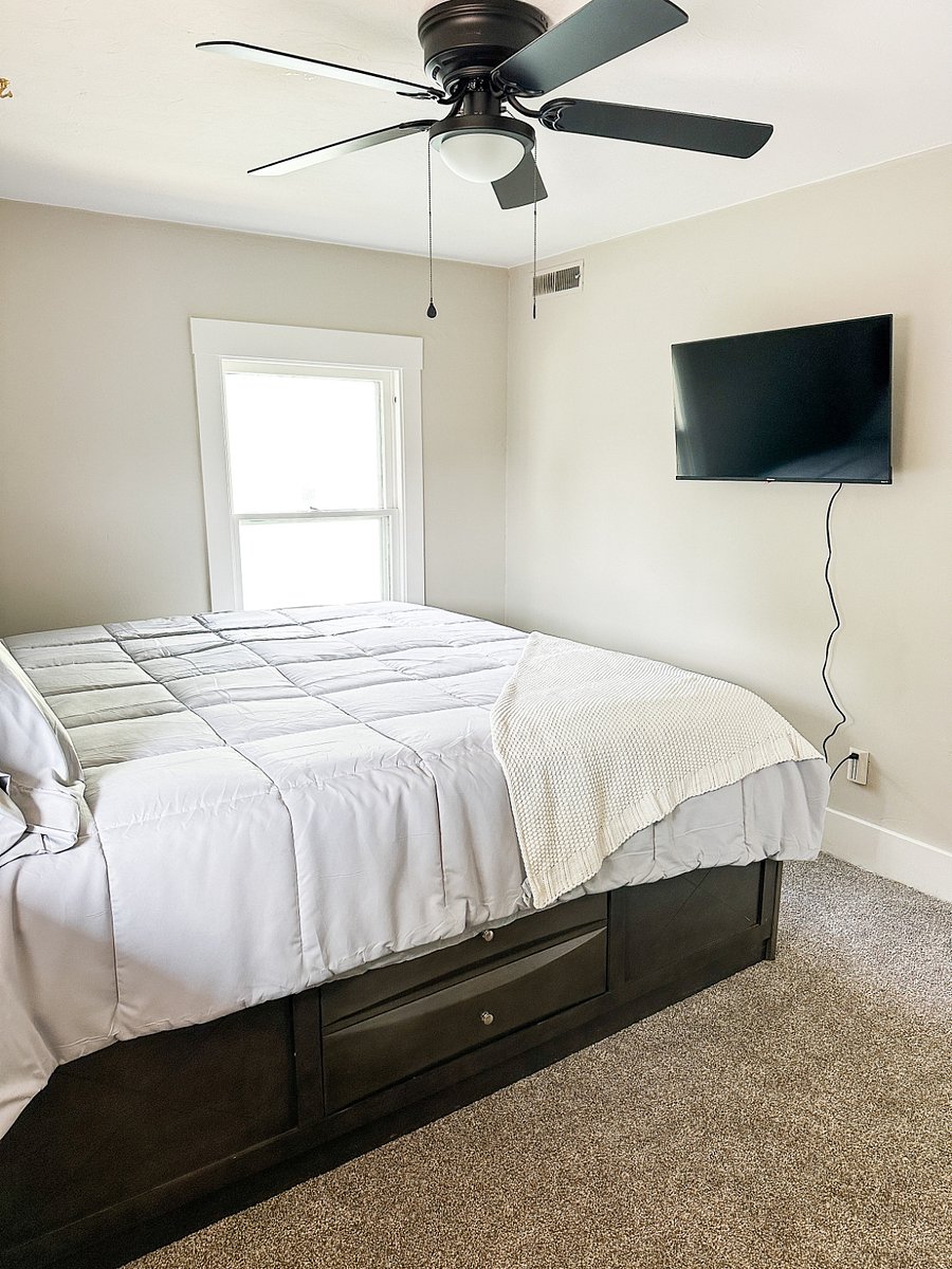 Bedroom 1: King Size bed, TV, Ceiling Fan and private closet. Ample storage for your clothing and personal items.