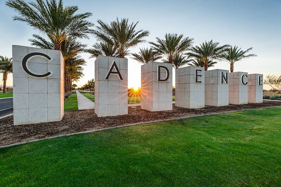Iconic Cadence entrance with palm-lined streets and a strong sense of arrival.
