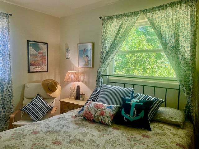The Cap Cod Room is so relaxing and charming, it will be easy to unwind in this cozy space. The room is 200 Square Ft., and comes with two large closets. The windows overlook the lush backyard and side yard, so natural diffused light, and tons of greenery coming into the room.