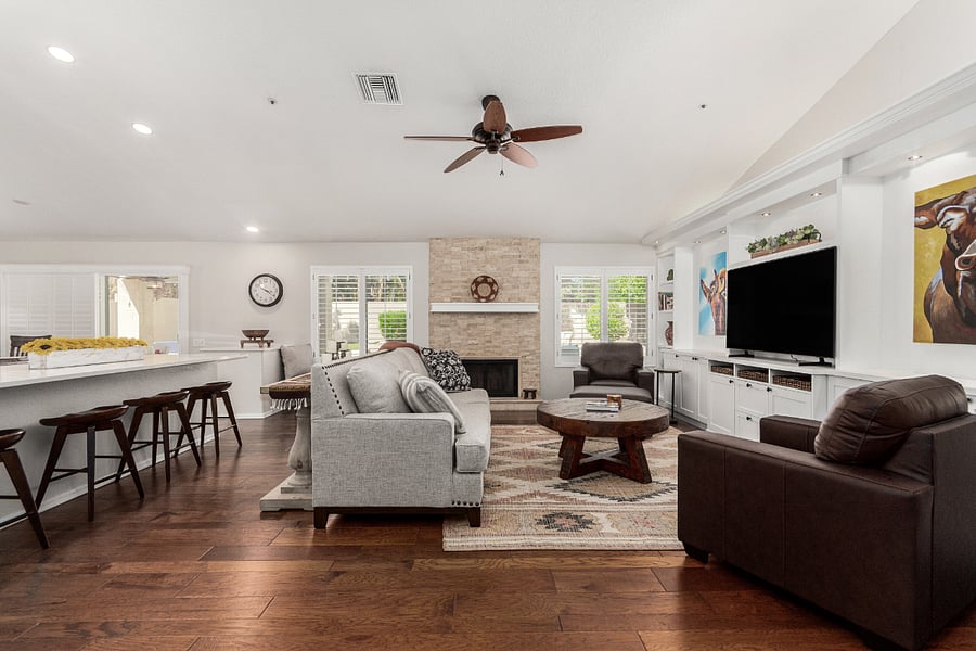 Family room with vaulted ceiling and bar seating