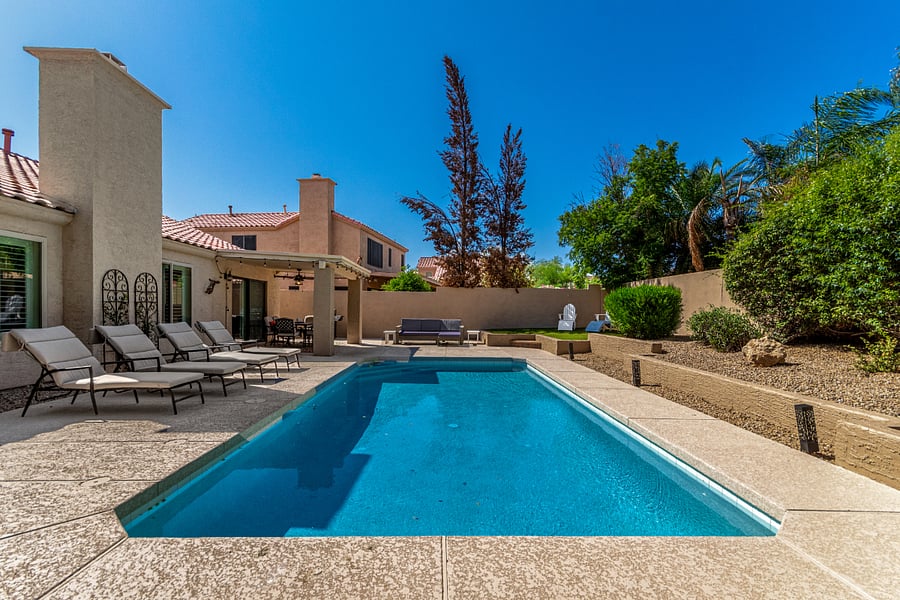 Pool with lounge chairs