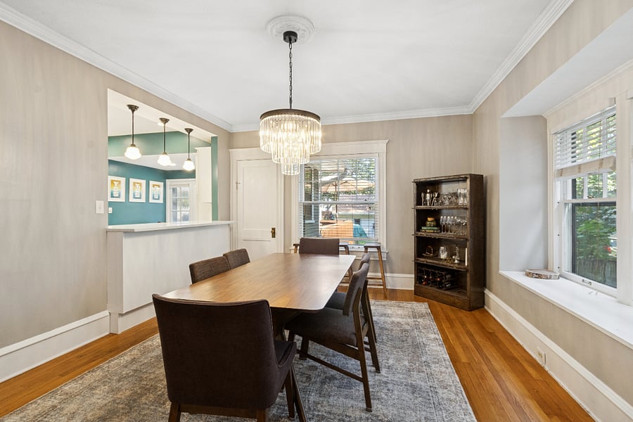 Dining room with bar cabinet and wine rack