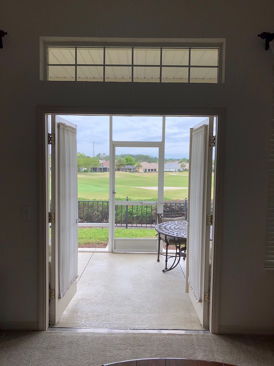 French doors lead to Lanai and views