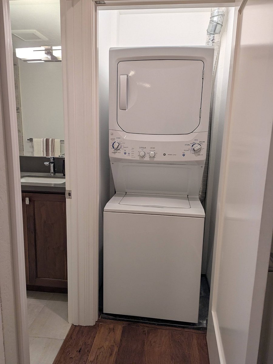 Washer/dryer are normally out of sight with door closed.