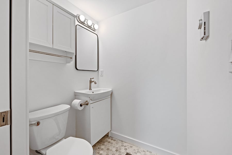 Upstairs half bath.