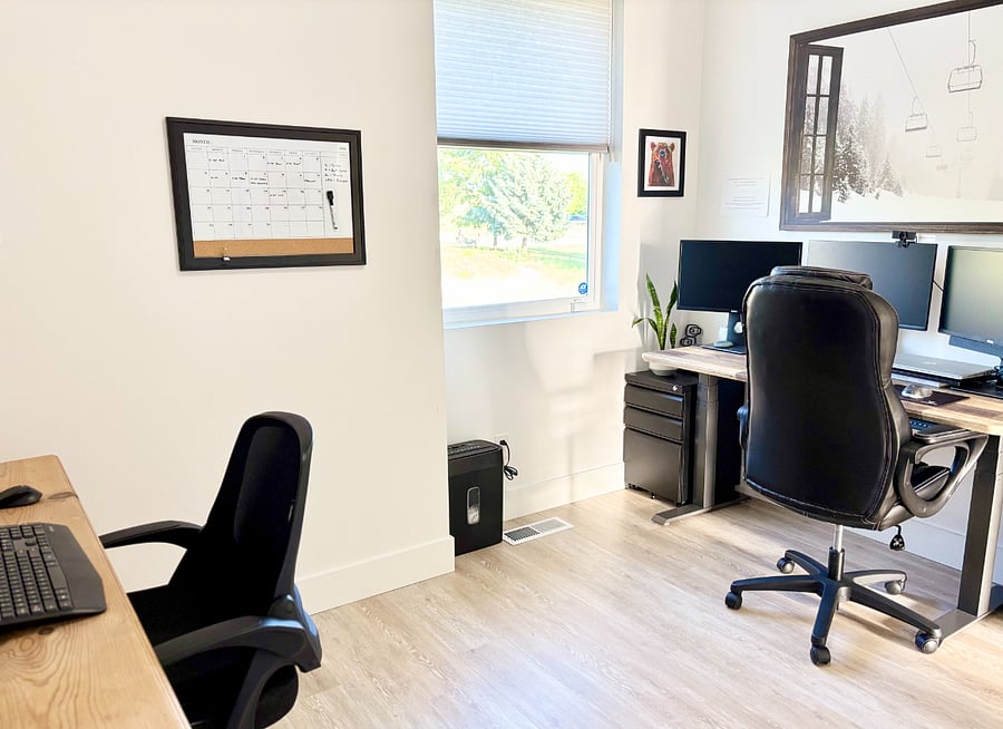 Dedicated office with an adjustable standing desk and secondary workspace.  Set up includes docking station, 3 monitors, & mouse/keyboard.  Just plug in your laptop and you're good to go.