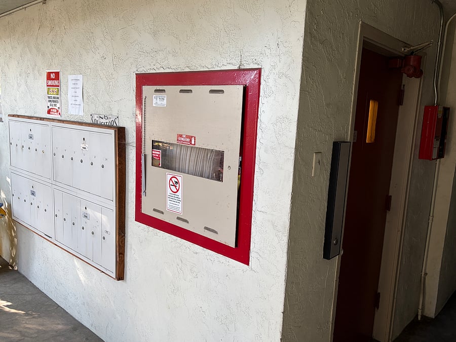 Ground floor mailboxes and elevator.